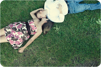 Engagement Photo kiss on grass